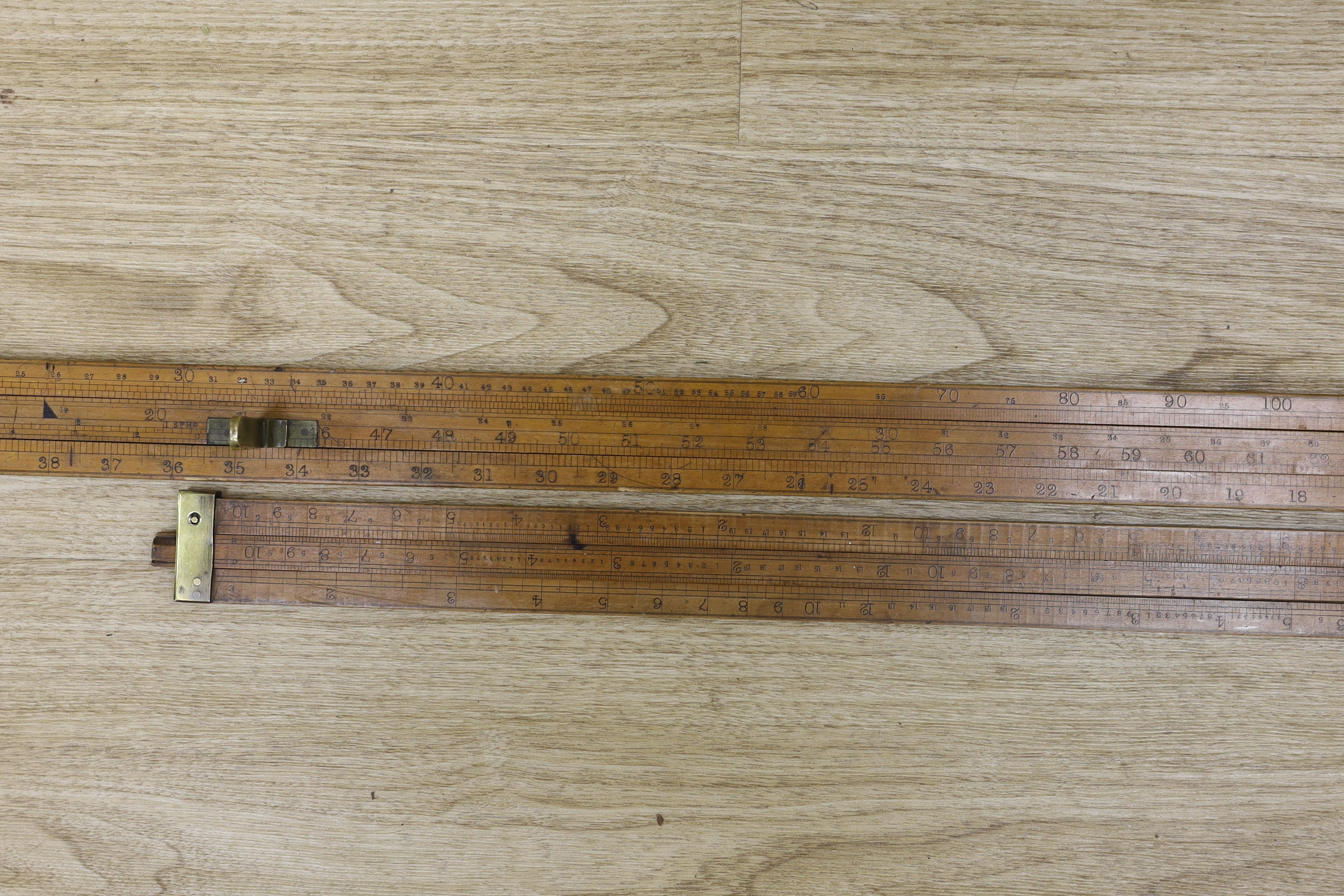 A Dring and Fage, London makers to the Customs & Excise extending rule and a similar smaller rule